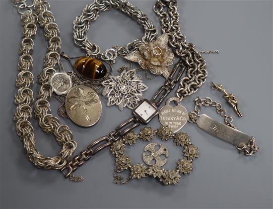 A group of silver and white metal jewellery.